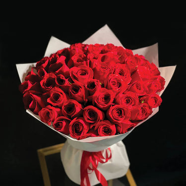 Red Roses Hand-Tied in White Wrapping